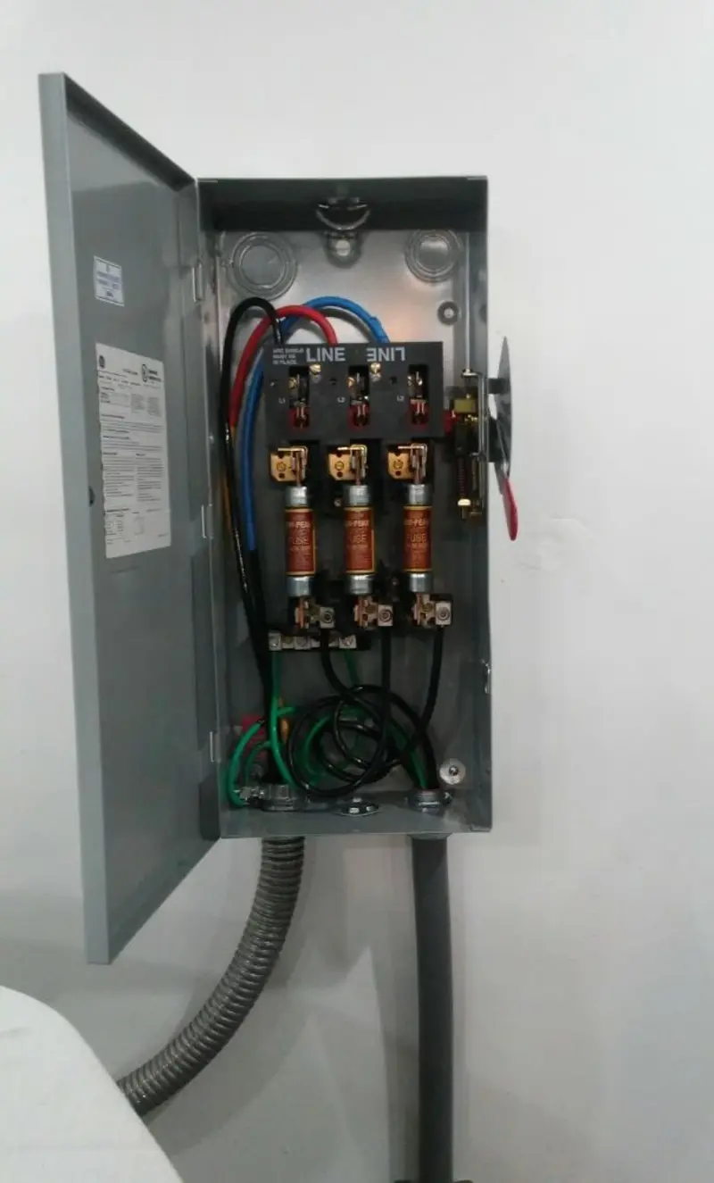 Three-phase disconnect switch installed for Smoke Detector Installation in Bowleys Quarters